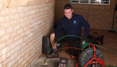 Joseph from The Brisbane Plumbers running a CCTV drain inspection to scope the job