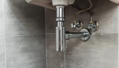 Brisbane homeowner with a leaking pipe under the bathroom basin