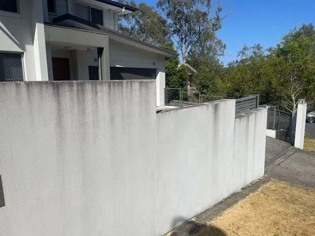 Rendered wall pressure clean before
