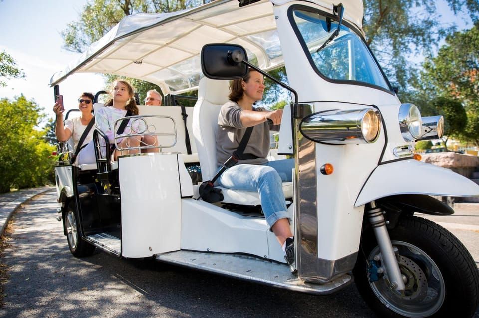 Driver and family gliding through a Brisbane park