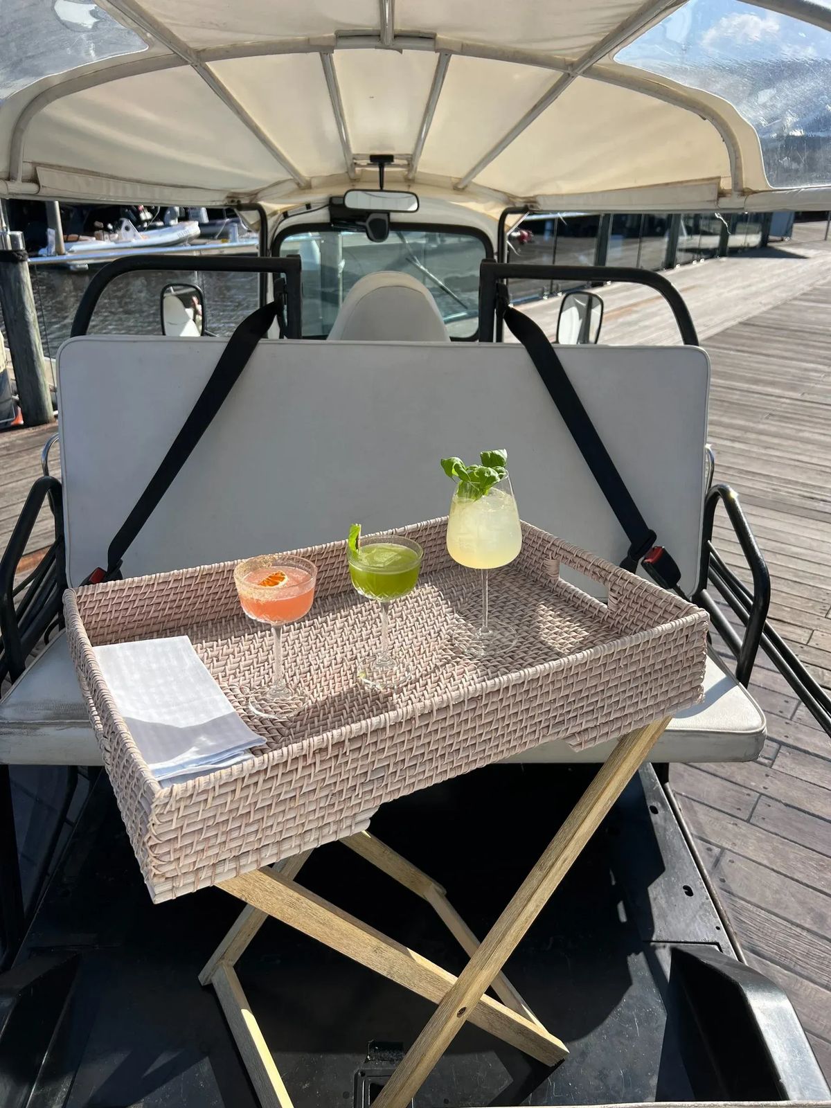 Drinks served on a tray aboard the tuk tuk