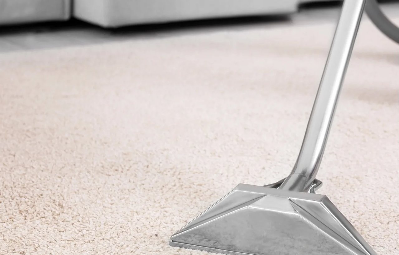 Steam cleaning carpet with extraction equipment