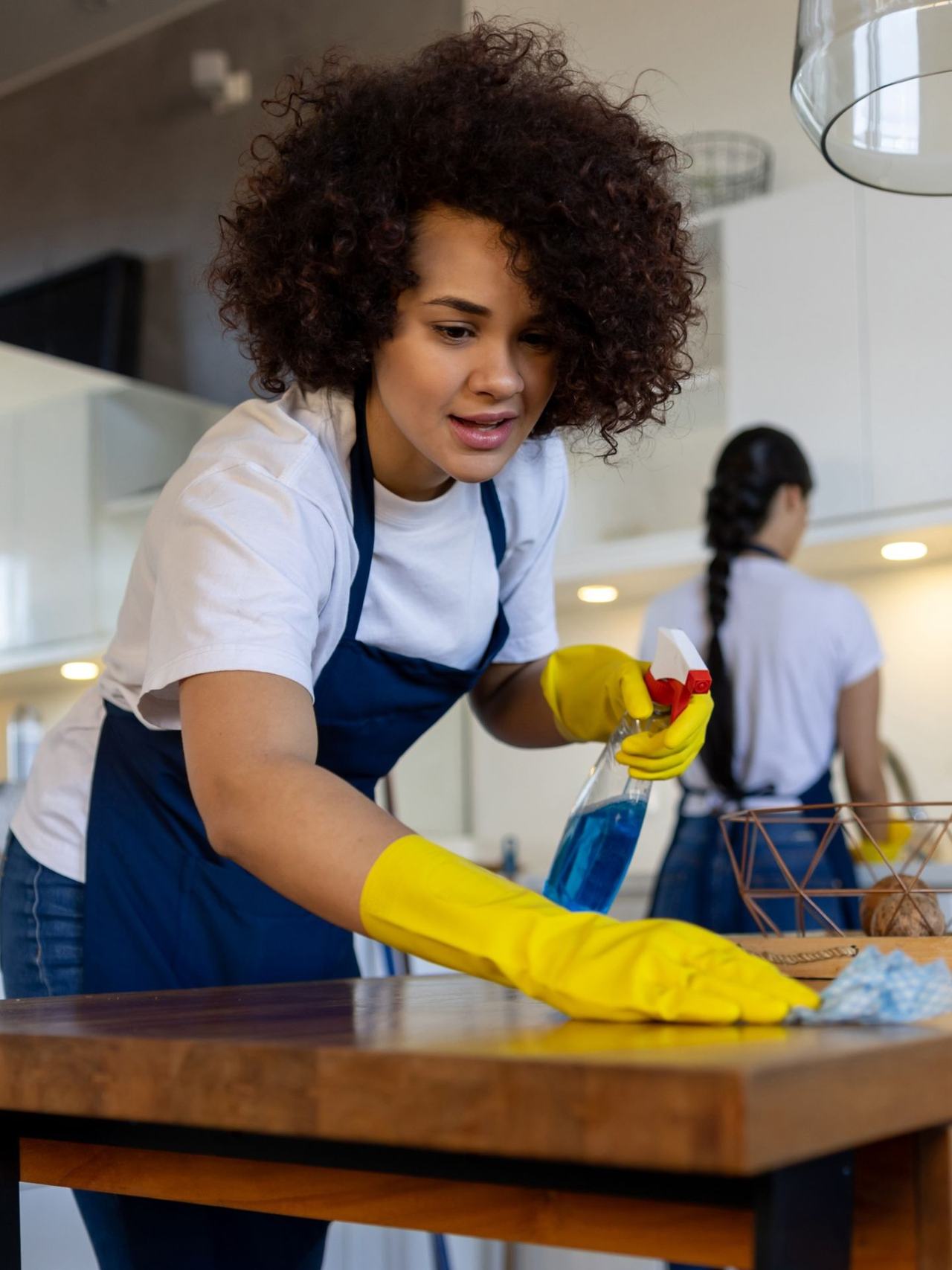 White Glove Cleaners team member cleaning a Brisbane home