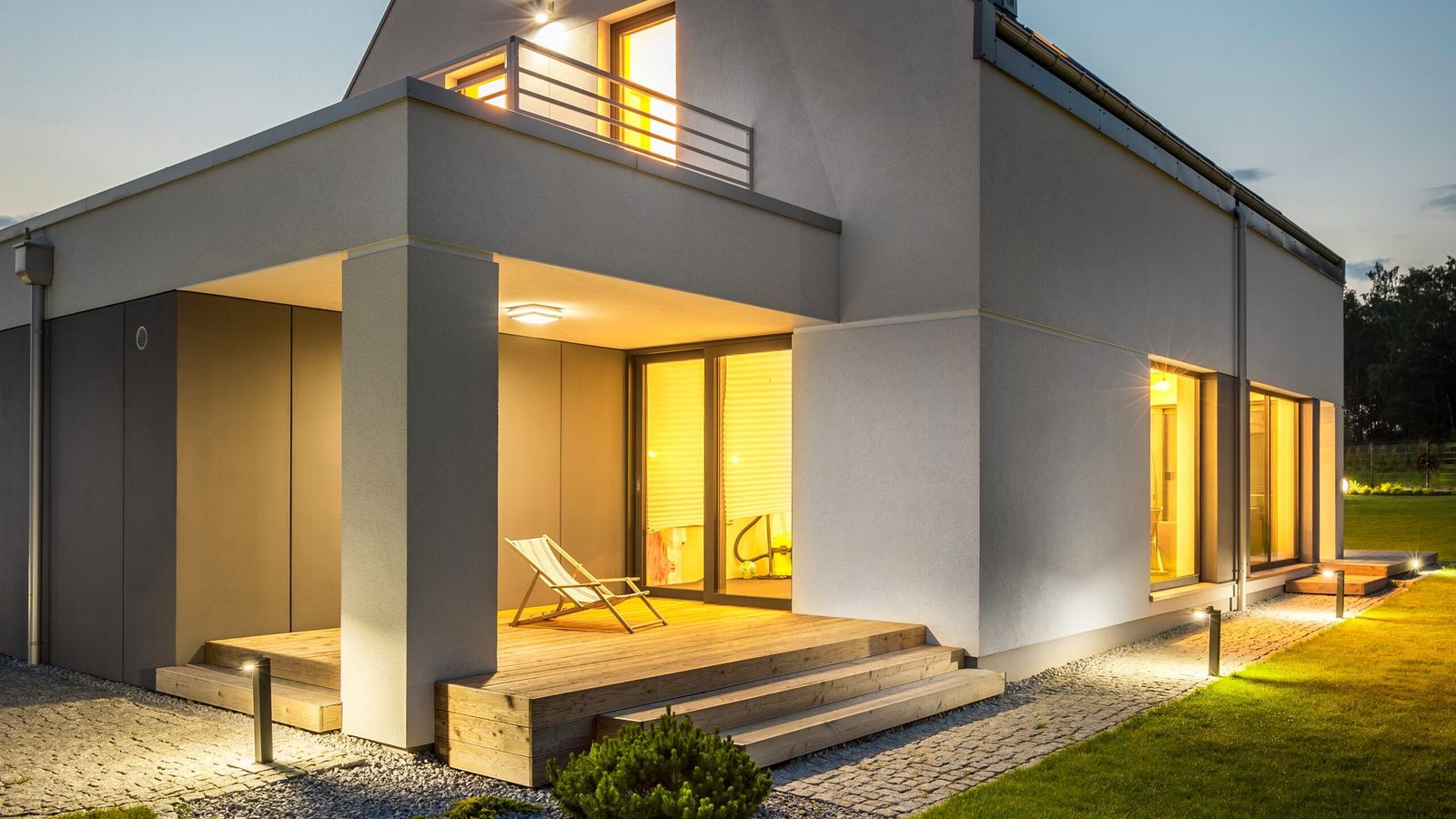 Modern Brisbane home with professional lighting at dusk
