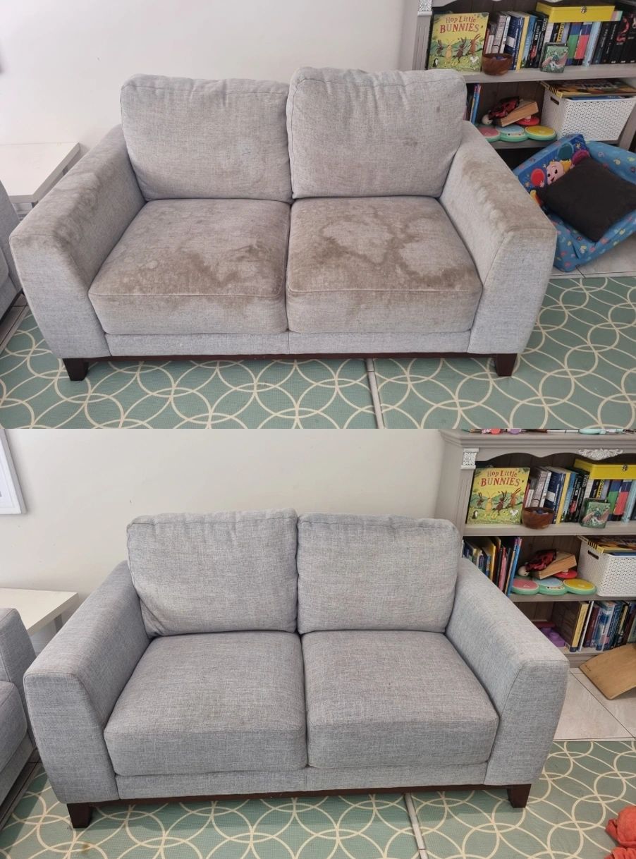 Loveseat with heavy stain lifted