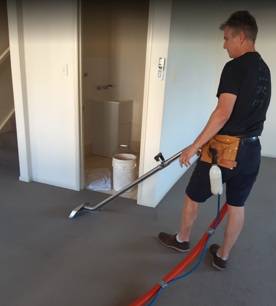 XtraMile technician deep-cleaning a Gold Coast carpet